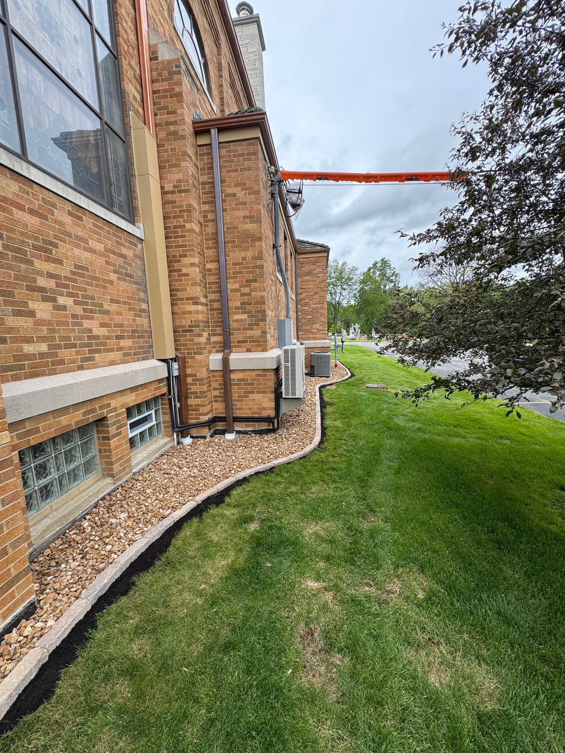 Gallery photos for Landscape Rock and Paver Edging at Holy Name Church in Cedar Lake: Image #1