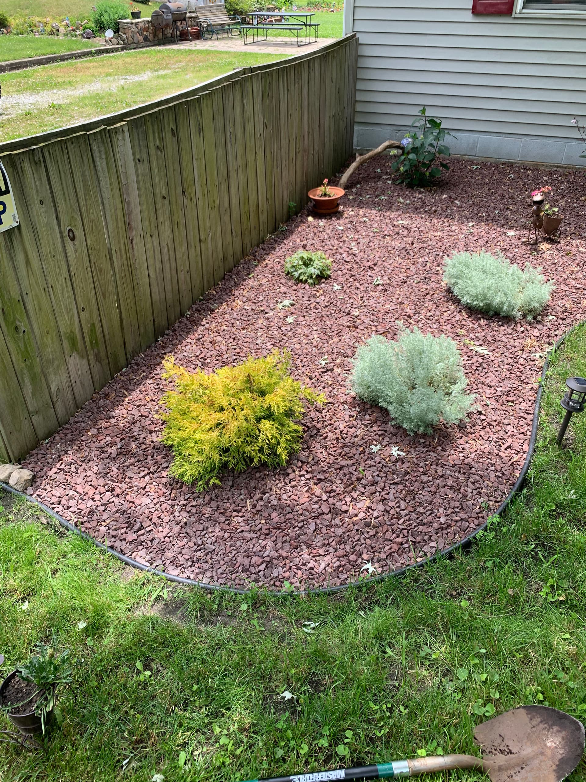 Gallery photos for Garden Overhaul with Vibrant Planting and Red Stone: Image #2