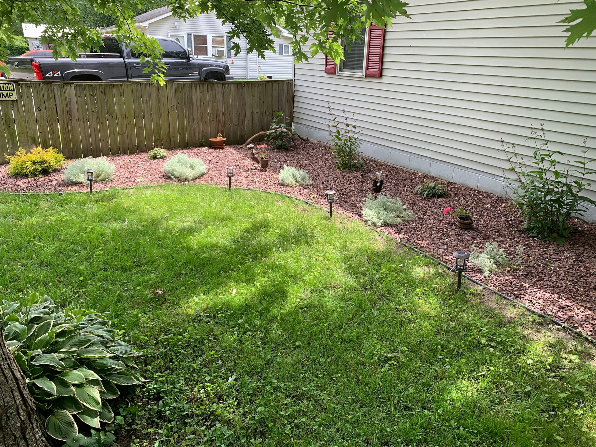 Gallery photos for Garden Overhaul with Vibrant Planting and Red Stone: Image #3