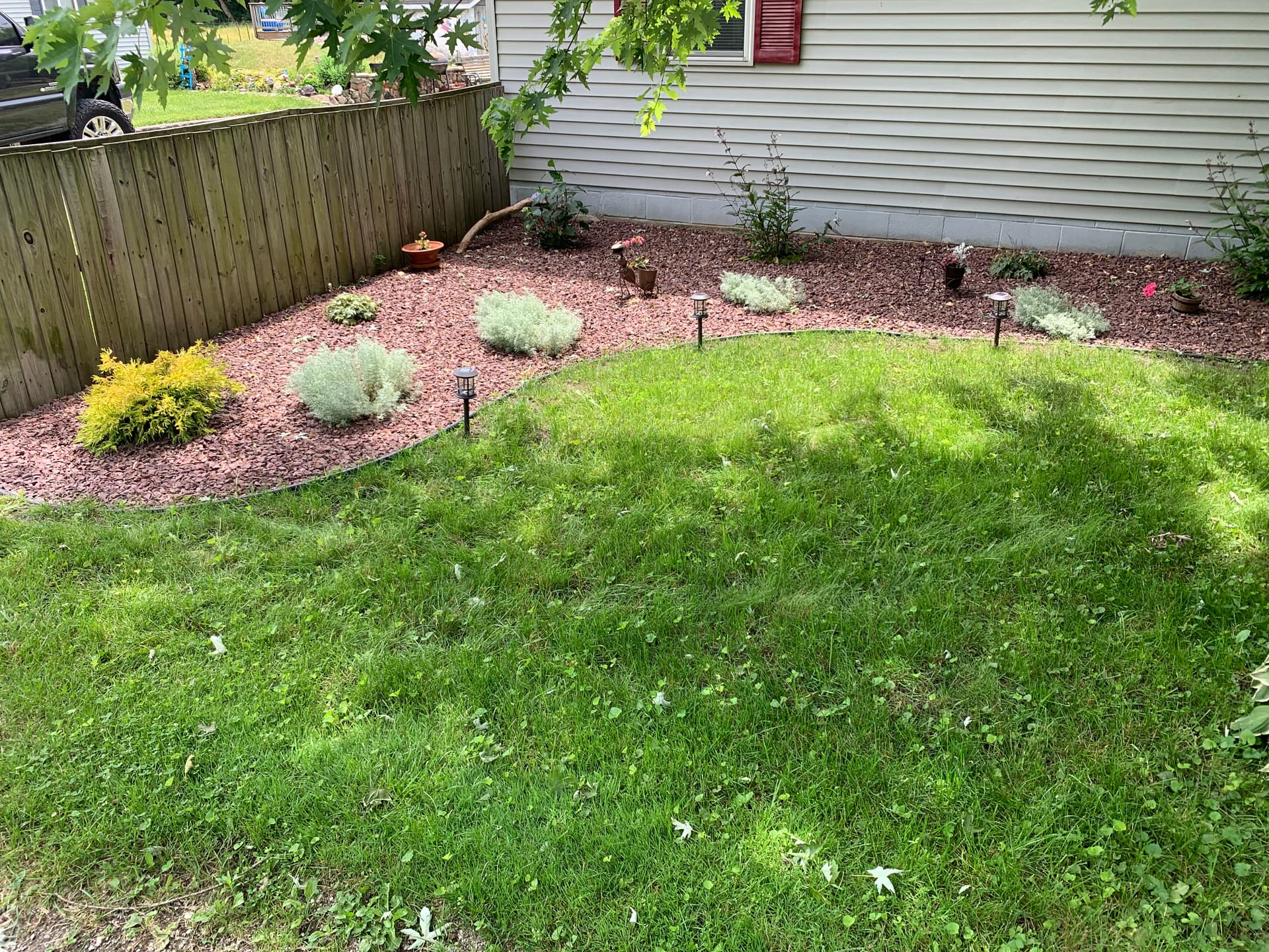 Gallery photos for Garden Overhaul with Vibrant Planting and Red Stone: Image #1