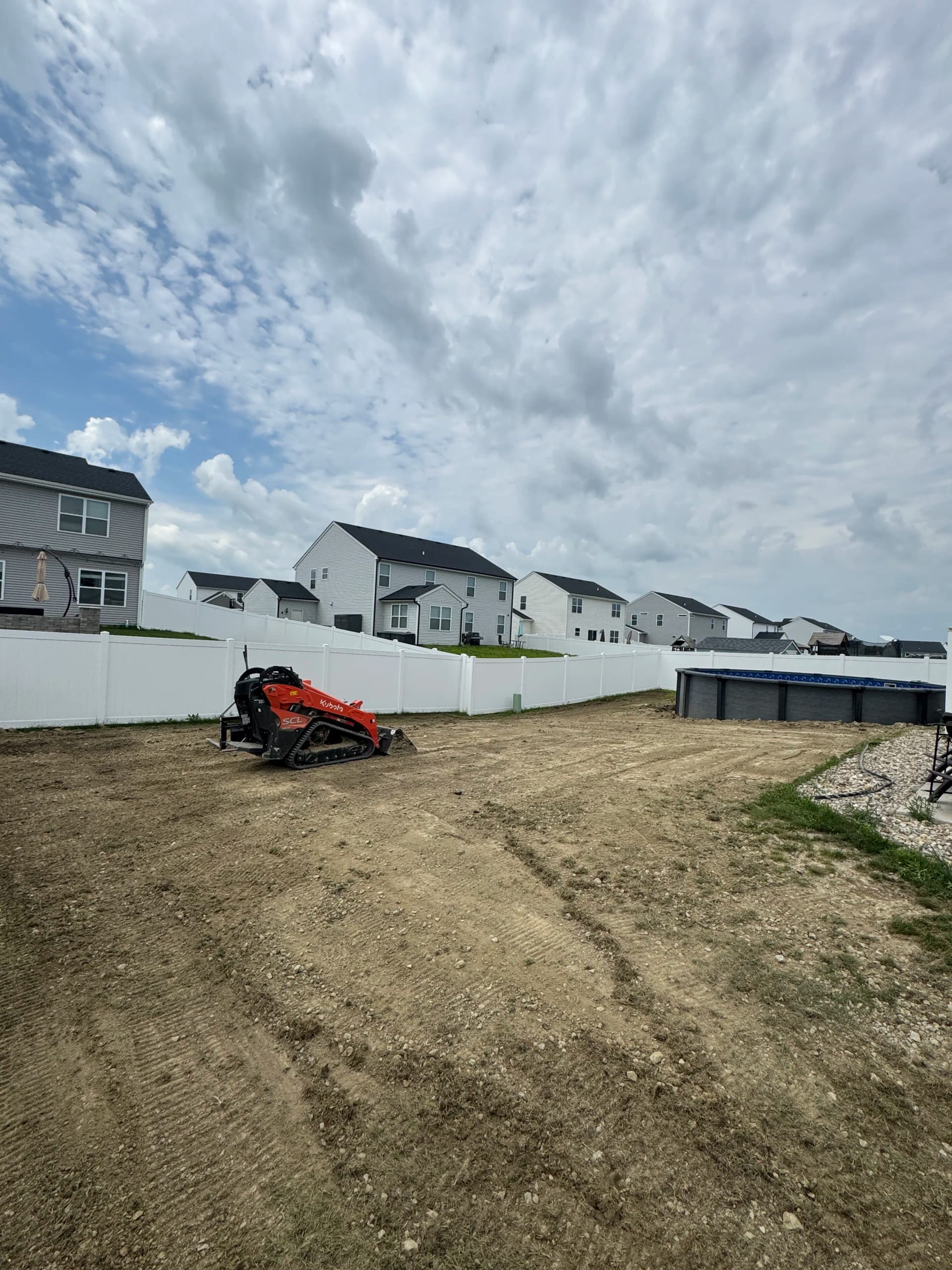 Gallery photos for Bare Clay Backyard Gets Sod, Gravel and Flagstone Makeover: Image #1