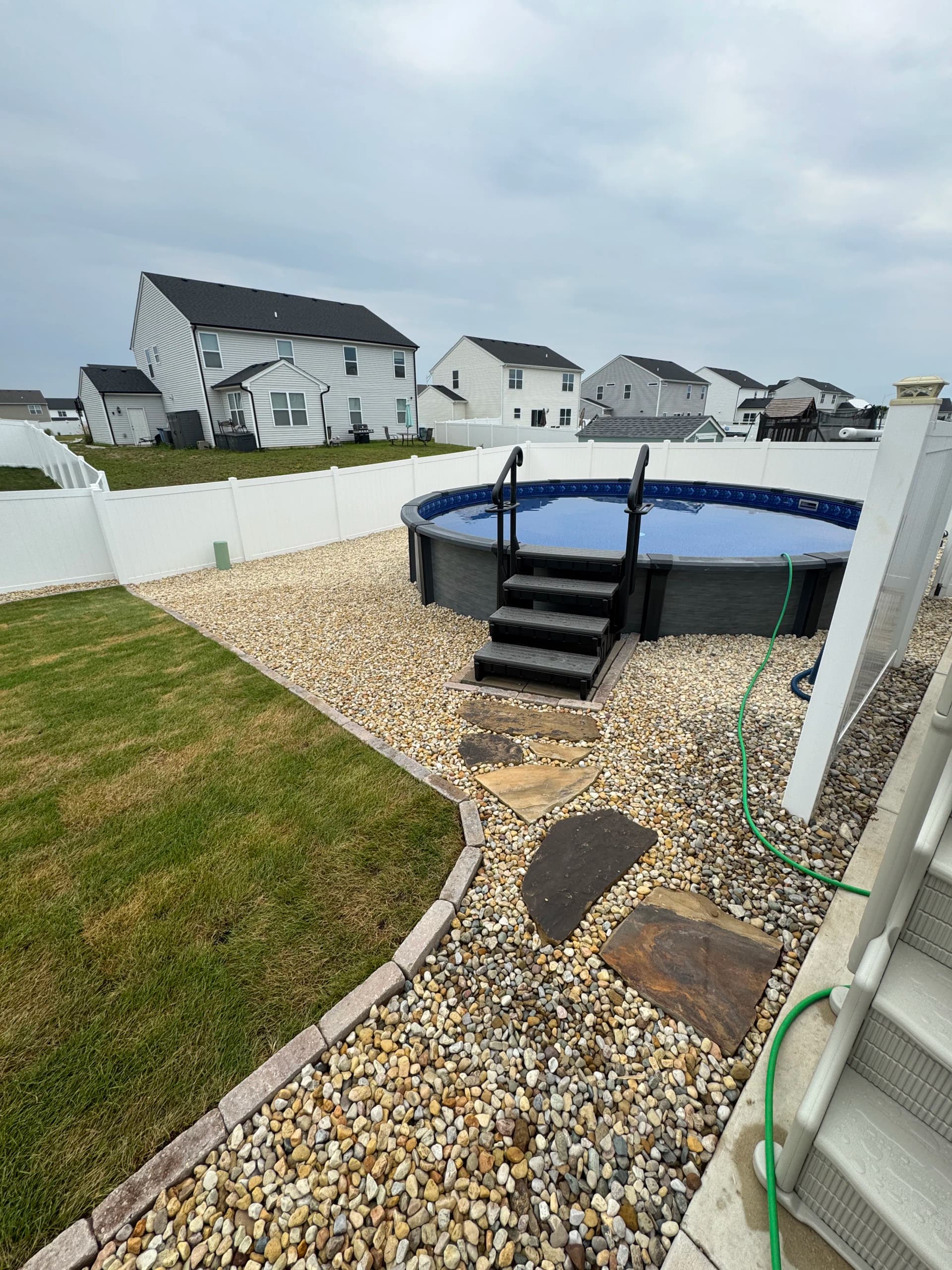 Gallery photos for Bare Clay Backyard Gets Sod, Gravel and Flagstone Makeover: Image #3
