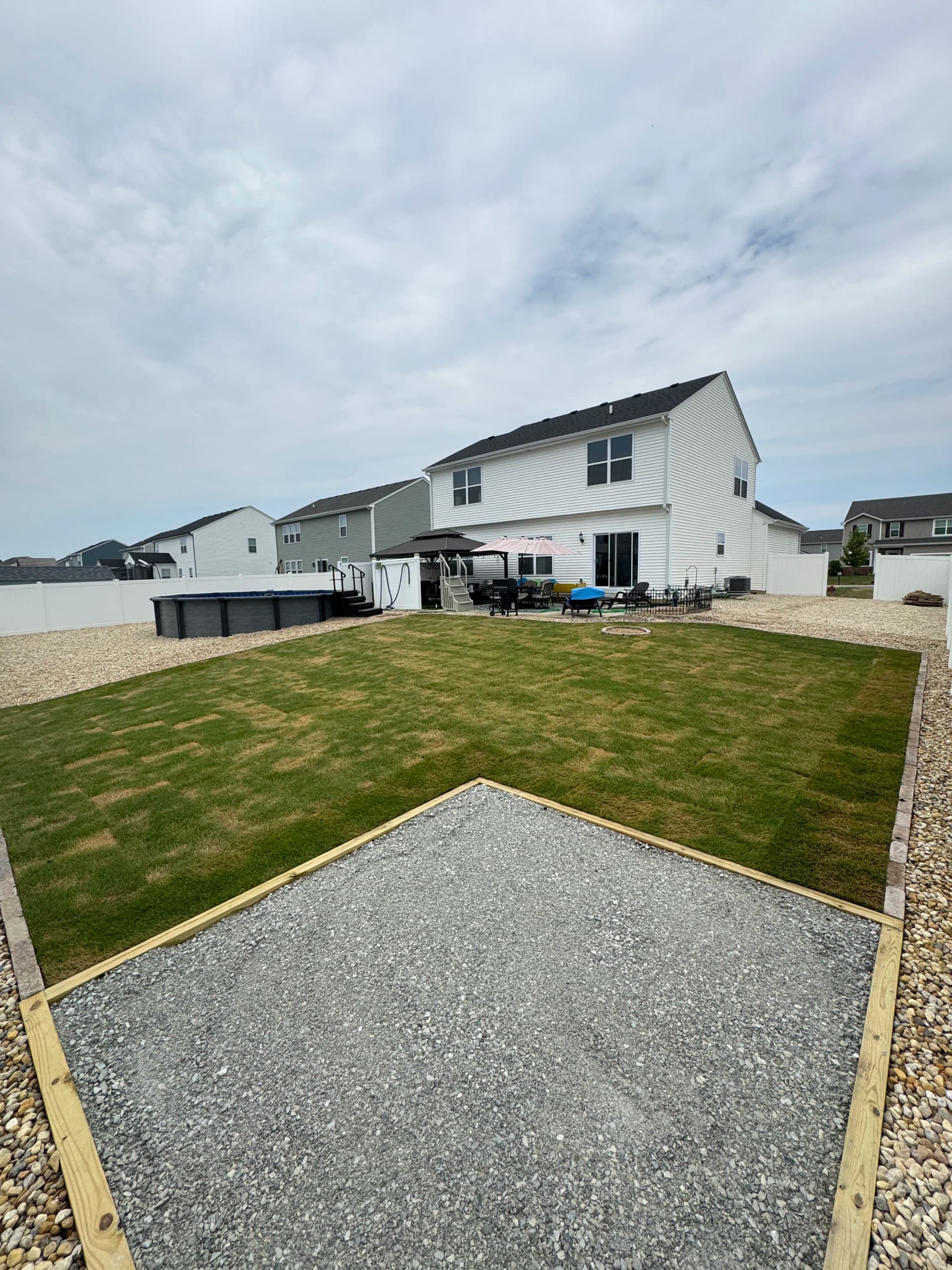 Gallery photos for Bare Clay Backyard Gets Sod, Gravel and Flagstone Makeover: Image #8